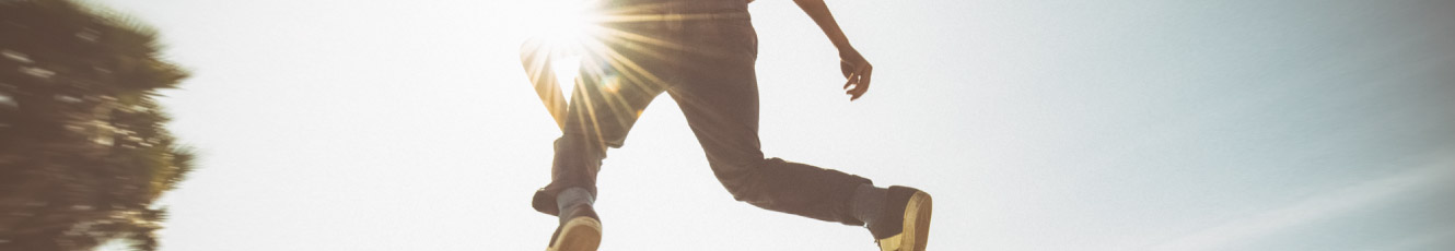 Skate boarder in the sun.