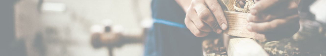 Close up of carpenters hands.